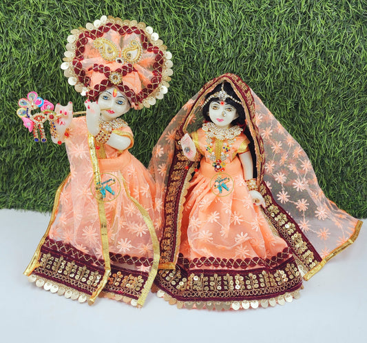 Cute peach net dress for Radha Krishna ji